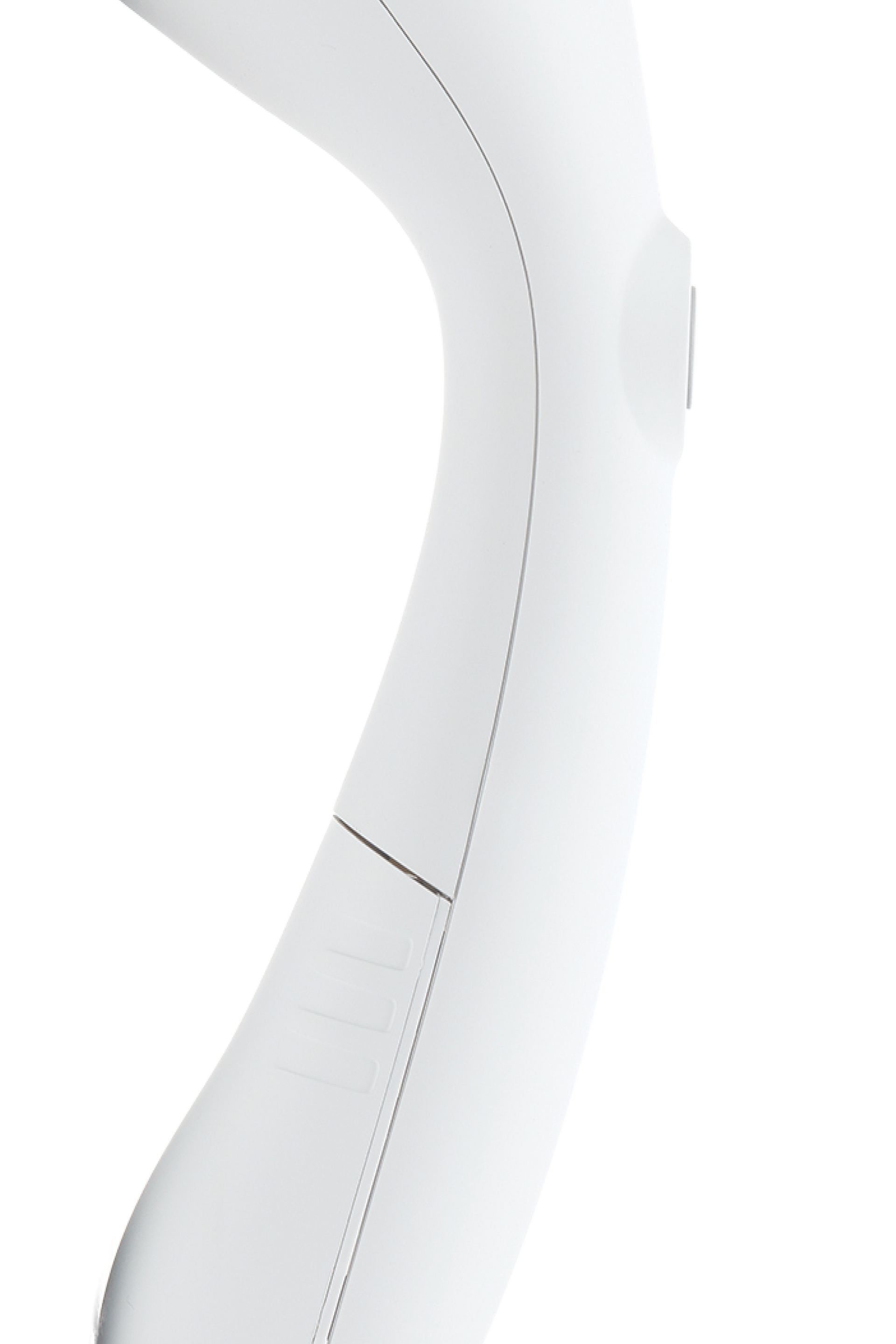 Close-up of a white handheld steamer on a white background