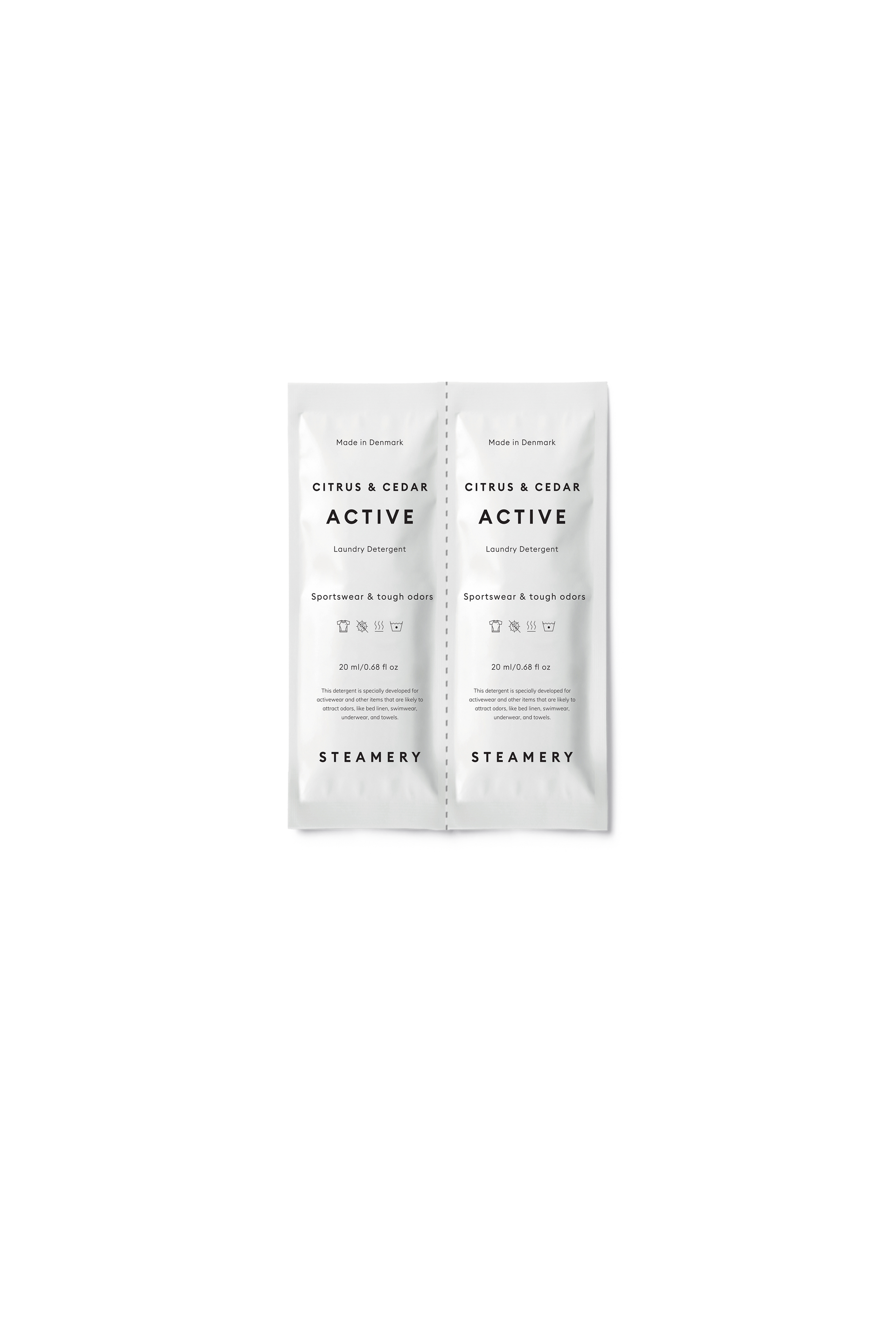 Two white packets of Steamery Citrus & Cedar Active sachets on a white background