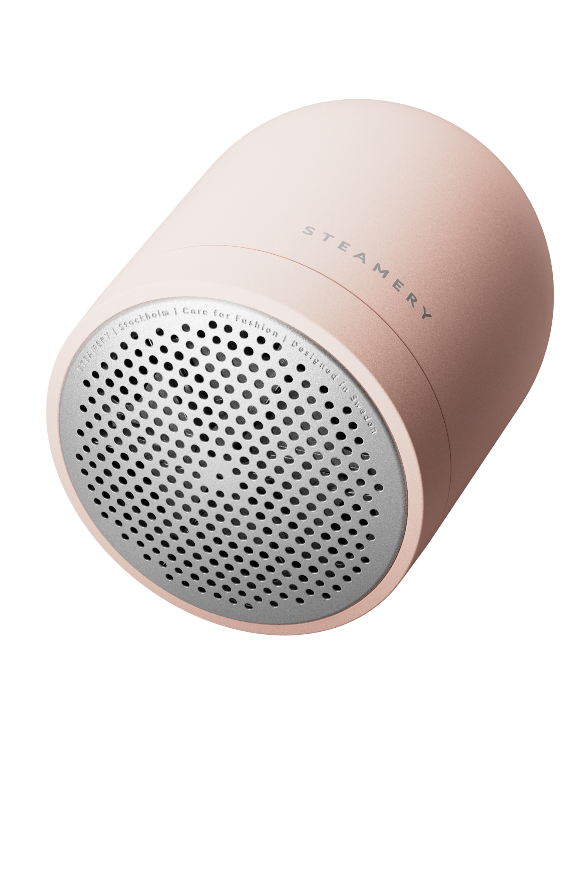 Pink fabric shaver on white background