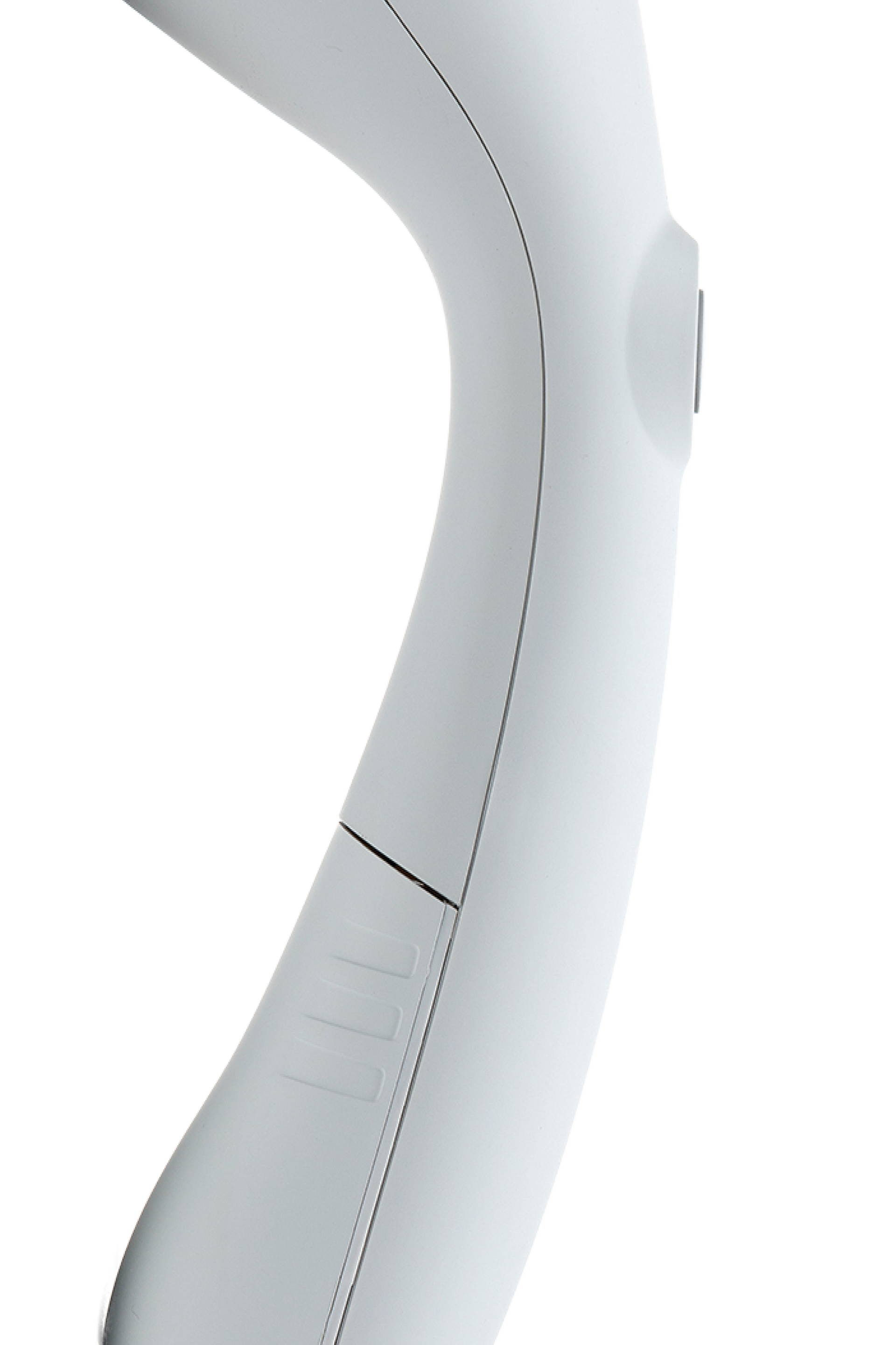 Close-up of a white steamer on a white background