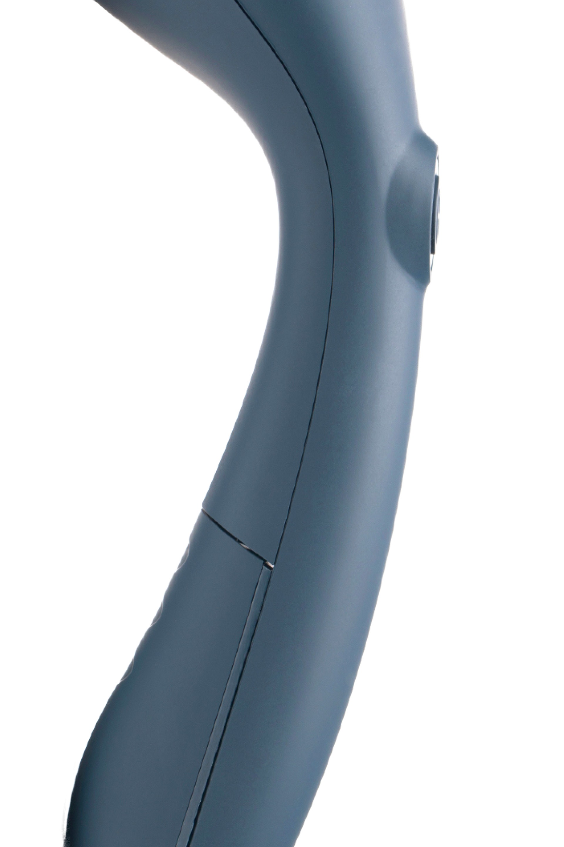 Close-up of a blue steamer on a white background