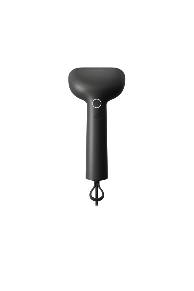 Black handheld steamer in a white background