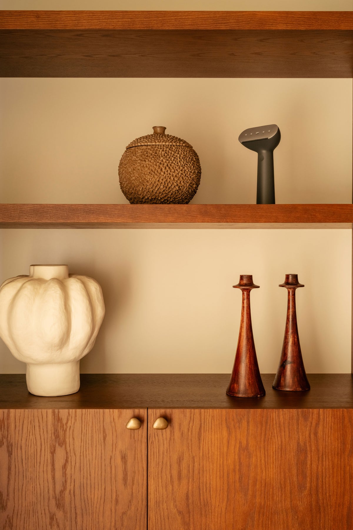 Black steamer on a shelf