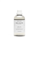 Bottle of hypoallergenic laundry detergent on a white background