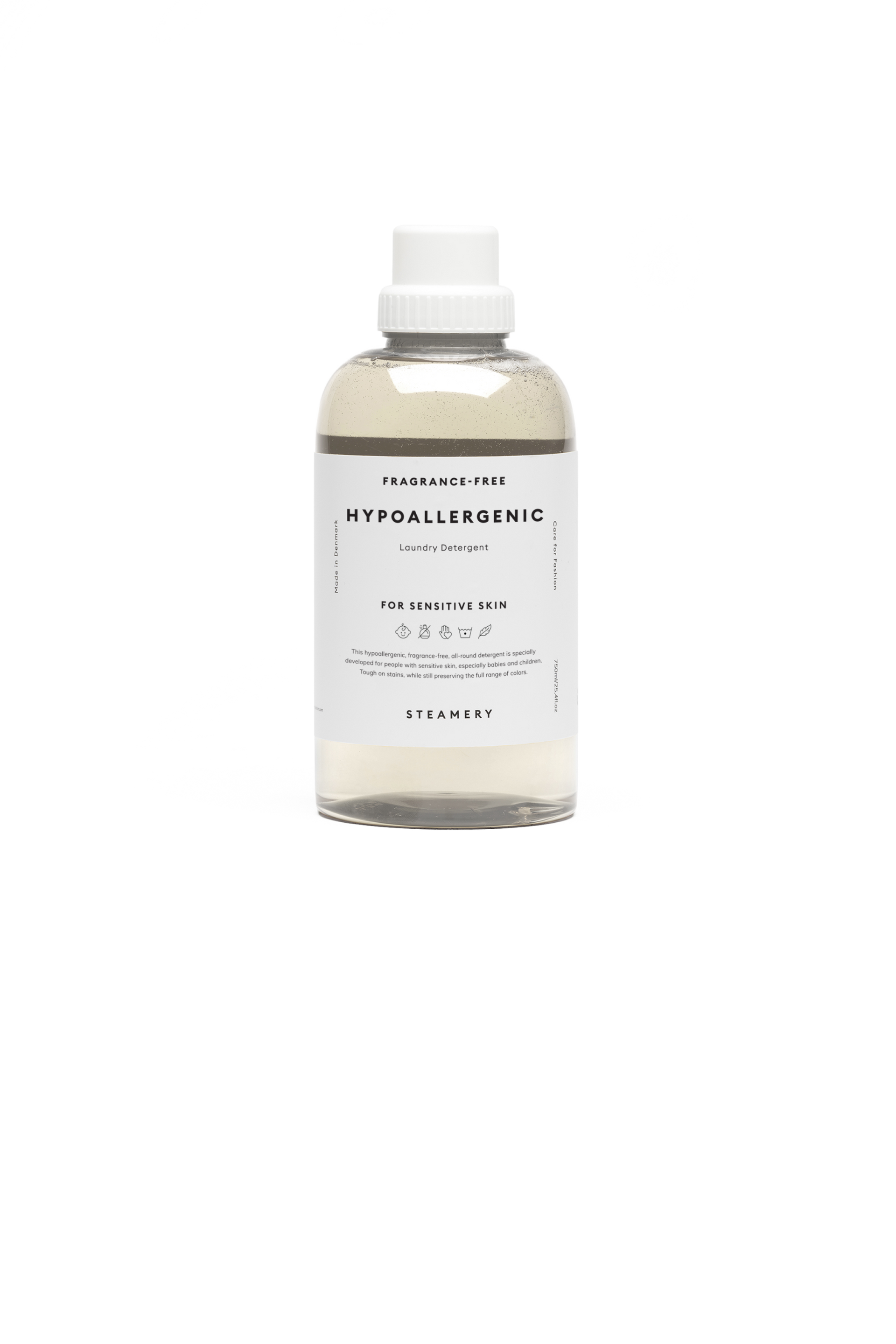 Bottle of hypoallergenic laundry detergent on a white background