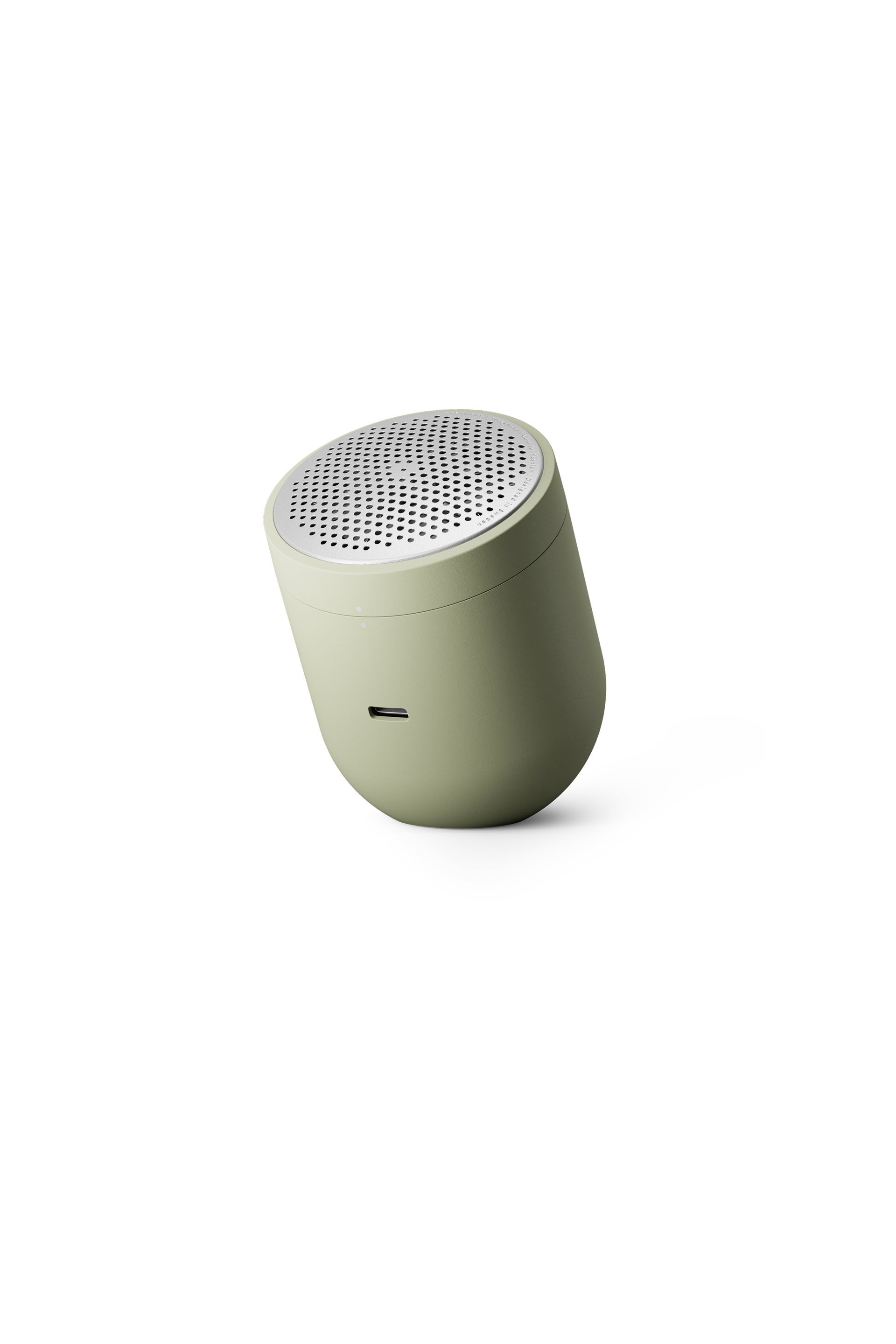 Light green fabric shaver on white background