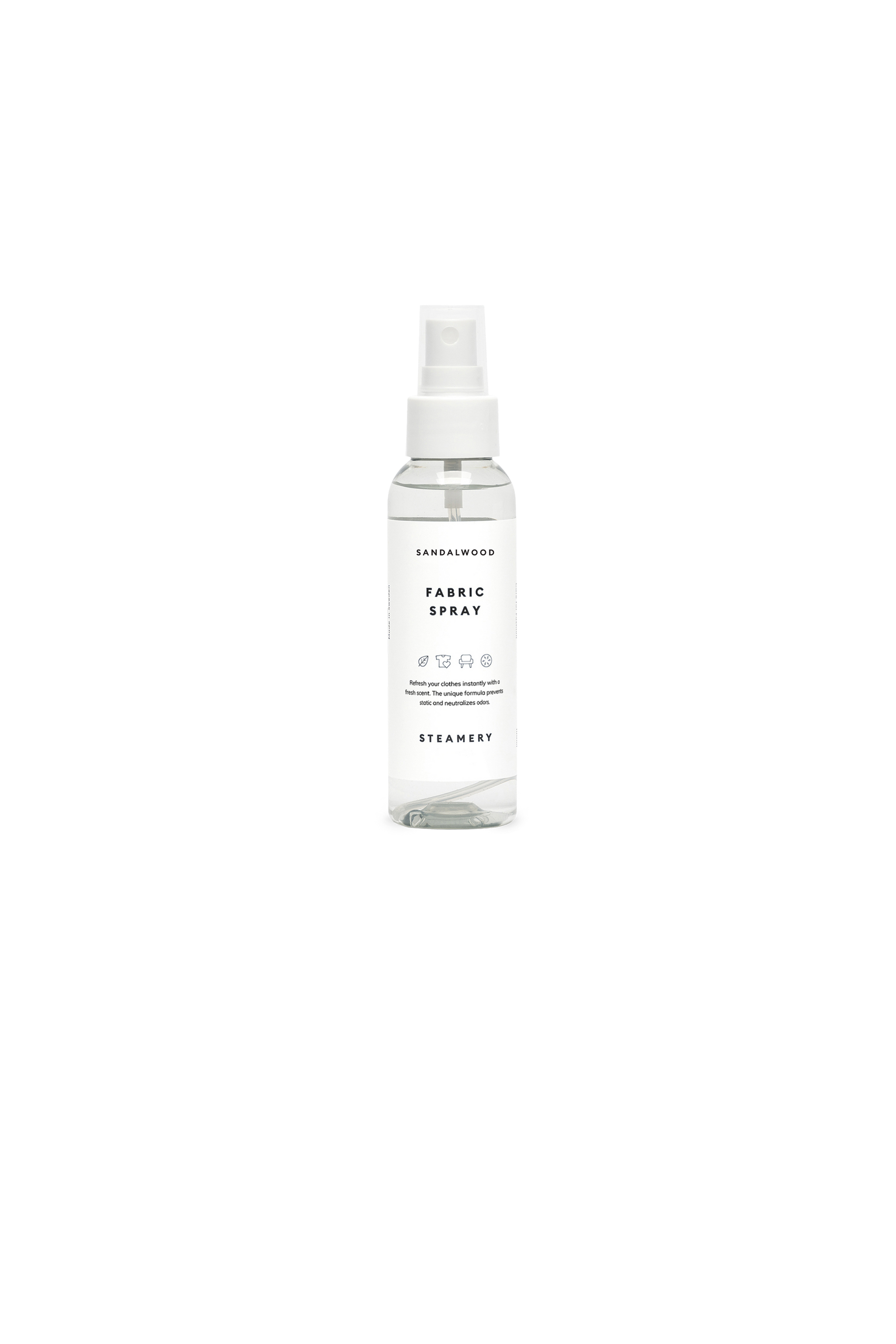 Clear spray bottle labeled 'Fabric Spray' on a white background