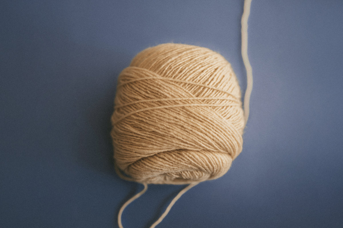 ball of off white yarn
